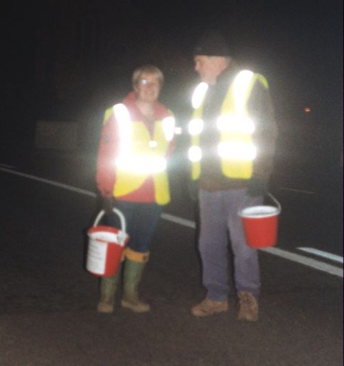 Charity collectors with buckets