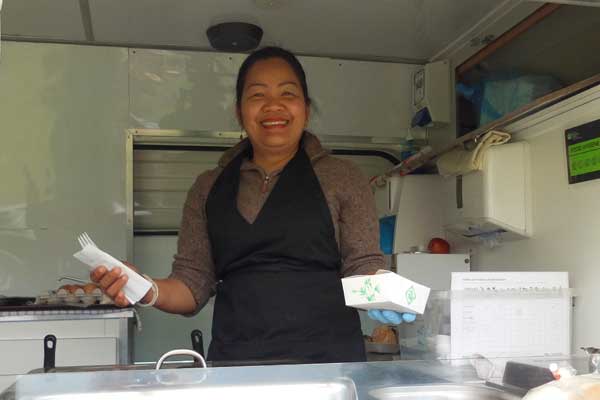 Lady working in Noodle Bar