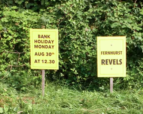Large Revels  poster by oak tree at fete site