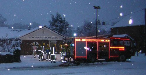 Fire engine - outside Vets  - - snowing