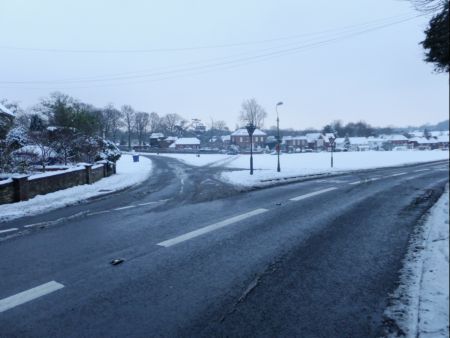 Snow scene junction A283 top of village green