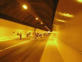 people walking thrugh Hindhead tunnel