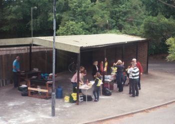 Food stall at Woolmer Hill collection point for bus