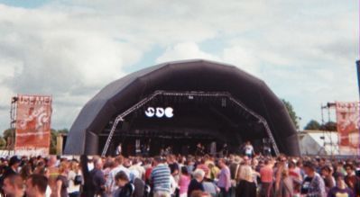 Outdoor stage semi-circular, and crowd of people