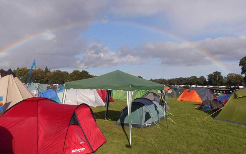 Rainbow over tents